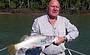 Ian and his 63 cm Barramundi while estuary fishing