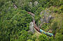 Kuranda Scenic Railway passing Robbs Monument